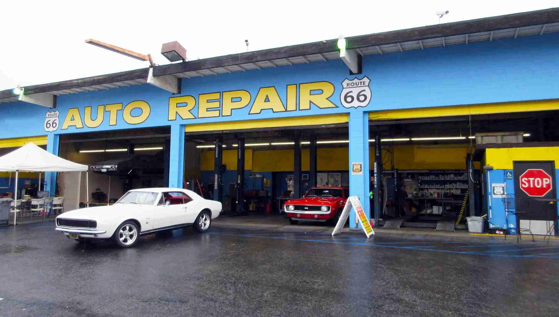 Route 66 Auto Repair shop exterior with open service bays at 1775 W Foothill Blvd, Upland, California
