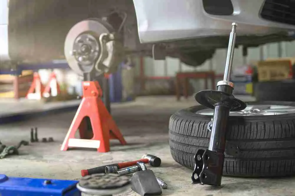 Brake rotor, shock absorber and wheel on the shop floor