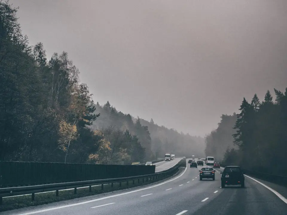 Cars on a foggy highway