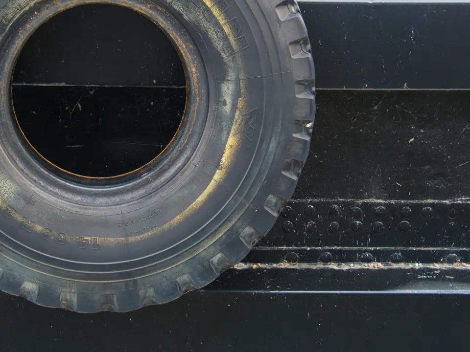 Close view of a large truck tire