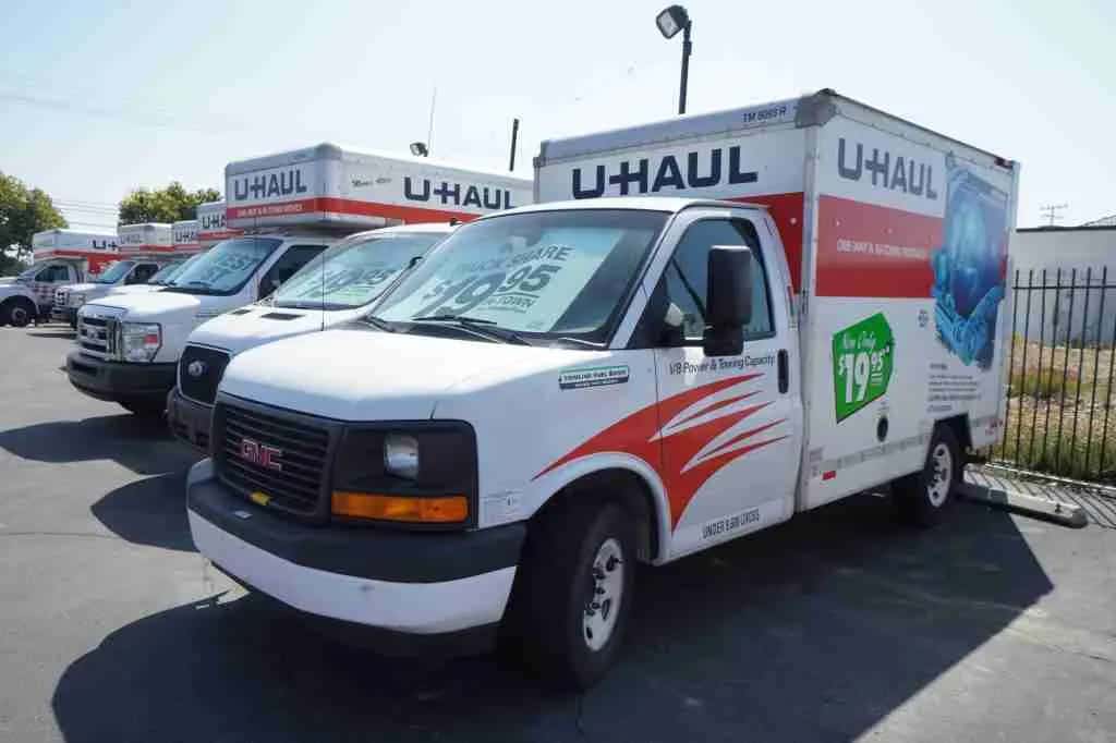 Row of U-Haul box trucks on the lot