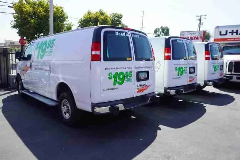 U-Haul cargo vans parked on the lot