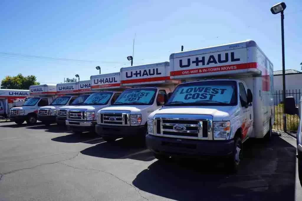 Row of U-Haul moving trucks on the lot